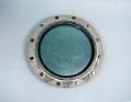 Image of Porthole from the tank room in the Naval Reserve Center Armory building at South Lake Union, ca. 1941