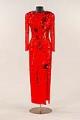 Image of Red crepe chiffon dress worn by Congresswoman Jennifer Dunn to a White House Christmas Party, ca. 1992-2004