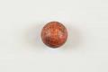 Image of Orange plastic street hockey ball used for bike polo in Seattle, ca. 2005