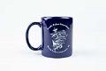 Image of Coffee mug featuring the WTO conference in a cyclone, given as gift from the Seattle Police Department to conference worker, L.A. McNeal, 1999
