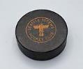 Image of Seattle Totems hockey puck, ca. 1960s