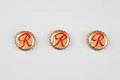 Image of Set of three Rainier Mountain Pale Ale beer bottle caps with rebus puzzles, 2016