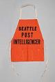 Image of Orange Seattle Post-Intelligencer sales apron, ca. 1950s-1960s