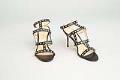 Image of Pair of Ivanka Trump heels with Nordstrom Rack discount stickers, 2017