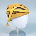 Image of Mustard yellow hat, made by John Eaton, 1960s