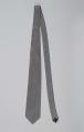 Image of Black and white necktie worn by Reverend Dr. Samuel B. McKinney, 1990s
