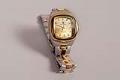 Image of Gold and silver colored wristwatch, ca. 1980s-2010s