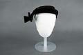 Image of Black hat with side bow from The Bon Marché, 1950s