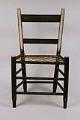 Image of One of a pair of slat back side chairs with woven rawhide seats, ca. 1850-1880