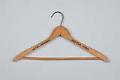 Image of Wooden clothes hanger from the Hotel Gowman in Seattle, ca. 1930