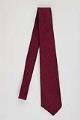 Image of Silk necktie with red and navy woven pattern, ca. 1950s-1990s