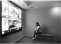 Image of Skip Wright looking at stained glass in Meditation Room at Bailey-Boushay House, Seattle, December 26, 1991