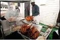 Image of Woody Jackson frying turkeys outside Catfish Corner, Seattle, November 20, 2001