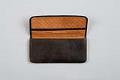 Image of Wallet and coins that once belonged to Morgan James Carkeek, ca. 1866