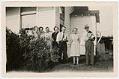 Image of Anna and Franz Hardow posing with friends and family near house, Seattle, 1940
