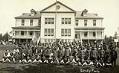 Image of Children in front of girls' dormitory building, Tulalip Indian School, circa 1912