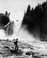 Image of John Peterson fly fishing at Snoqualmie Falls, near Snoqualmie, 1950