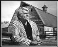 Image of Jack Barron standing in front of barn, 1978