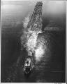 Image of Boat towing logs on Lake Union, Seattle, 1955