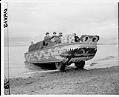 Image of Amphibious vehicle carrying newspapers, Seattle, March 1, 1948