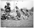 Image of Indigenous dancers fancy dancing at the Ellensburg Rodeo, September 1945