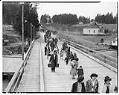 Image of Japanese American families leaving Bainbridge Island, March 31, 1942