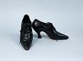 Image of Pair of black French-style heeled shoes, ca. 1905