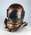 Image of Diver's helmet and shoulder gear used by Henry Finch, 1890 - 1920