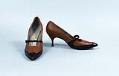 Image of Pair of tan and black pumps, worn as part of Century 21 Seattle World's Fair Fashion Show, 1962
