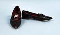 Image of Pair of black flat pumps, worn as part of Century 21 Seattle World's Fair Fashion Show, 1962
