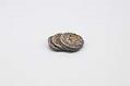 Image of Fifty cent pieces fused together from the Seattle Fire of 1889