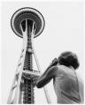 Image of Shirley Farnham taking photo of Space Needle, Seattle World's Fair, 1962