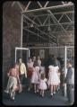 Image of A group of young girls entering a building at the Seattle World's Fair, 1962