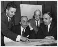 Image of Officials looking at plans for Seattle World's Fair, circa 1961