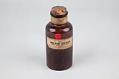 Image of Iron Oxide Red Merck apothecary bottle, one of many in a collection from Seattle Community College, ca. 1900