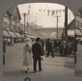 Image of Corner of University Way and 40th Street looking east, showing main gate of Alaska-Yukon-Pacific Exposition, Seattle, 1909
