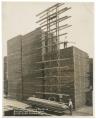 Image of Men stacking lumber at Seattle Cedar Lumber Manufacturing Company, circa 1920