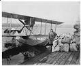 Image of Pilot Eddie Hubbard with Boeing B-1 mail plane at Lake Union, circa 1925