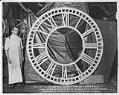 Image of Joseph Mayer & Bros. worker with clock dial for Chehalis County Courthouse, circa 1910