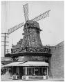 Image of Van de Kamp's Bakery windmill-shaped building on Queen Anne hill, Seattle, circa 1930