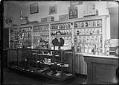 Image of Drugstore and barber shop, Seattle, circa 1910
