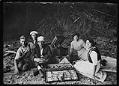 Image of Group listening to wax cylinder recordings on Ballard Beach, Seattle, circa 1913