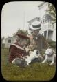 Image of Charles and James Clise with puppies, Redmond, circa 1905