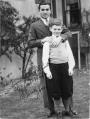 Image of Boxer Barney Ross and Cal Druxman in front of Druxman home, circa 1935