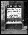 Image of J. Aronson Liquor sign at start of Prohibition, Seattle, circa 1916
