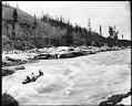 Image of Shooting White Horse Rapids in a canoe, 1905