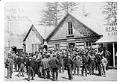 Image of Group outside Skagway City Hall, possibly a meeting about gangster Soapy Smith, circa 1898