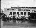 Image of Mechanics and motorcycles outside Wm. O. McKay Co. building, Seattle, November 13, 1939
