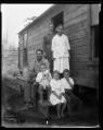 Image of The A.J. Sullivan family and their house, August 19, 1919
