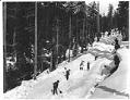 Image of Workers shoveling snow at Snoqualmie Pass, circa 1923